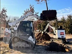 Forklift lifting dirt